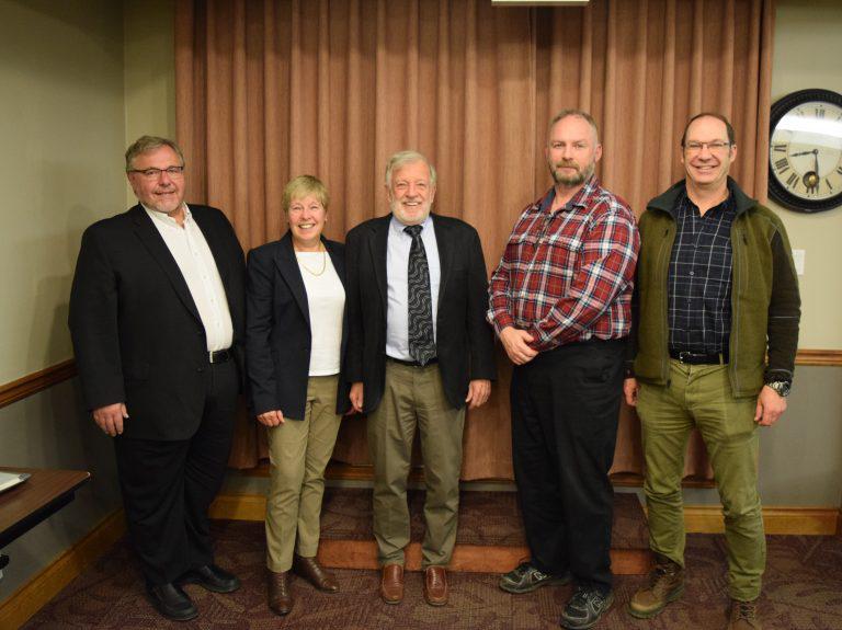 Sun Peaks council (four white men and one white woman) standing in a row